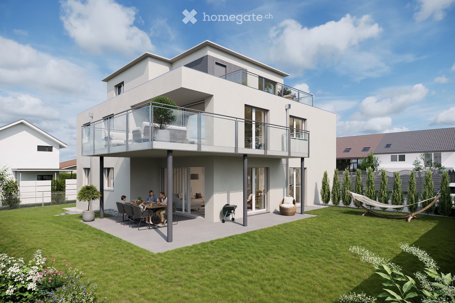 Modern two-story house with white exterior, large windows, balcony on the upper floor, and a spacious garden with patio seating and a hammock.