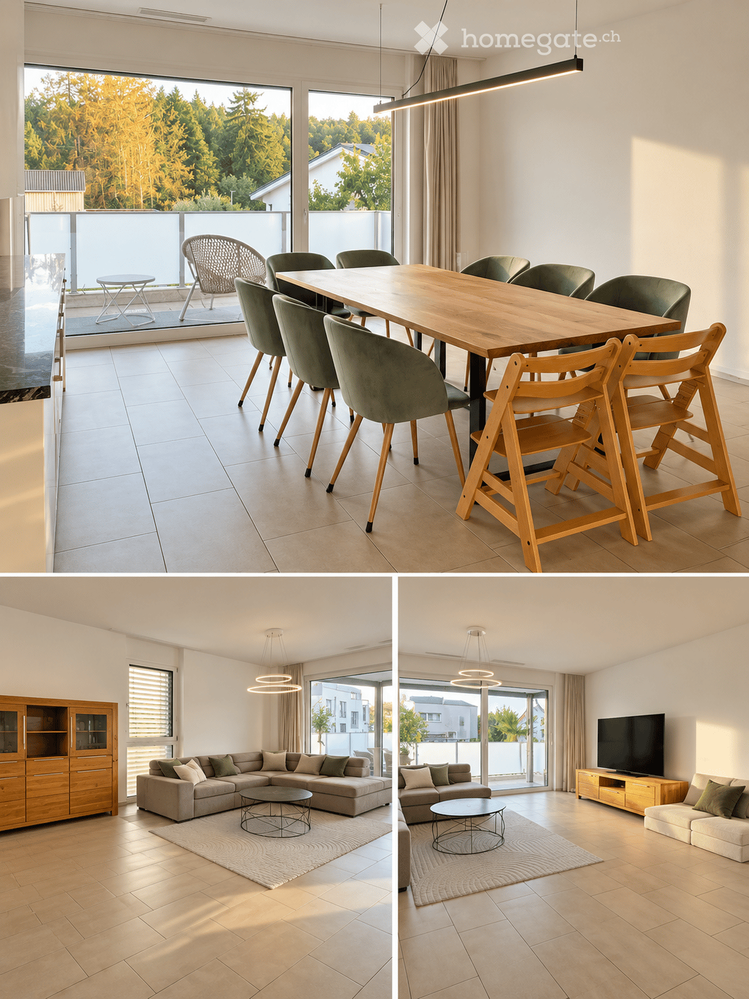 Modern, well-lit living and dining area with large windows offering a view of greenery. The dining area features a wooden table with multiple chairs, including a baby chair. The living area includes a sectional sofa, coffee table, and a wooden cabinet. Th
