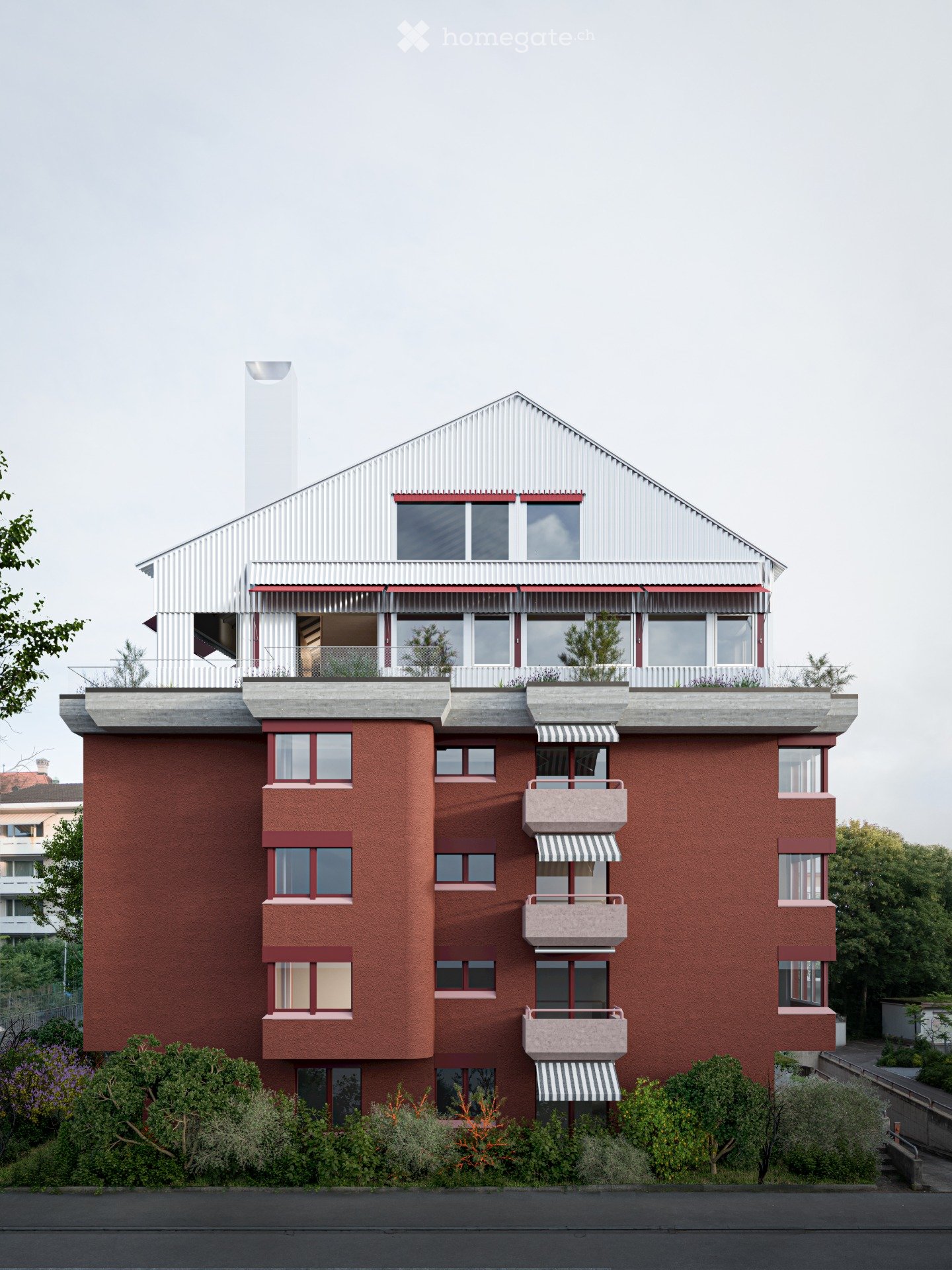 Modern multi-story building with red brick facade, white metal roof, multiple windows, balconies, and small garden area at the base.