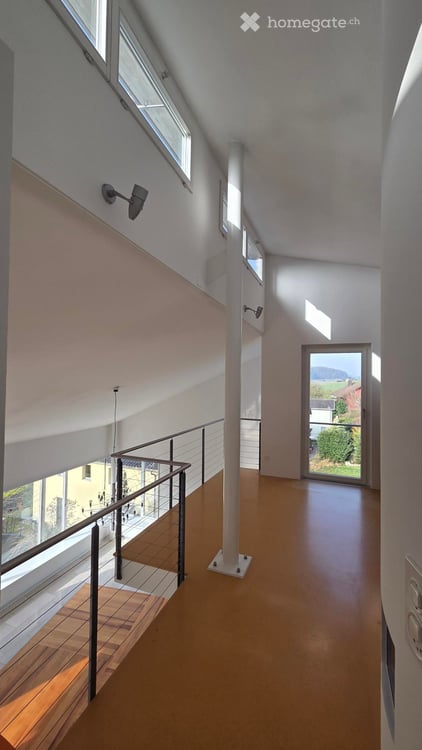 Stilvolle 124m2 Maisonette-Loft-Wohnung in Dättlikon mit Kamin und zwei Terrassen 12