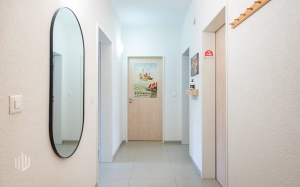 ImmoWyss -  Attraktives Mehrfamilienhaus mit Geschäftsräumlichkeiten 5