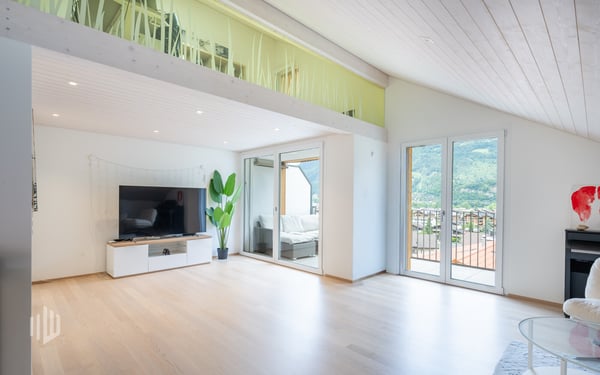 ImmoWyss - Moderne Dachwohnung mit Sicht auf See und Berge in Bönigen 4