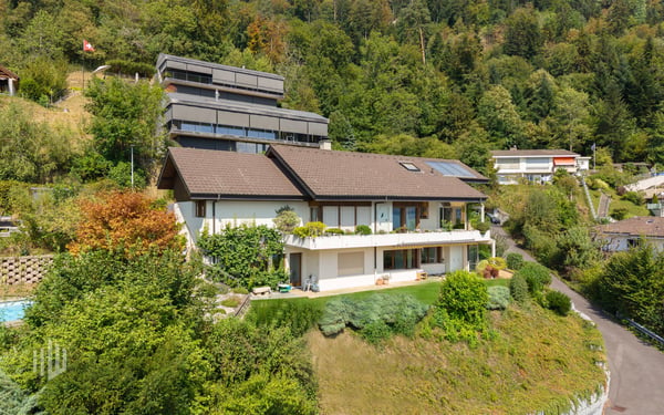 ImmoWyss -  Einfamilienhaus über dem Thunersee mit unverbaubarer Sicht