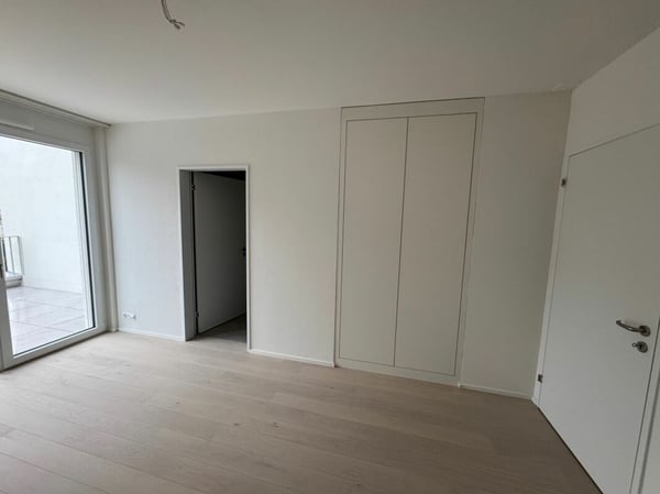 Erstvermietung: hochwertige 1.5-Zimmer-Attikawohnung mit Schloss- & Bergsicht 5