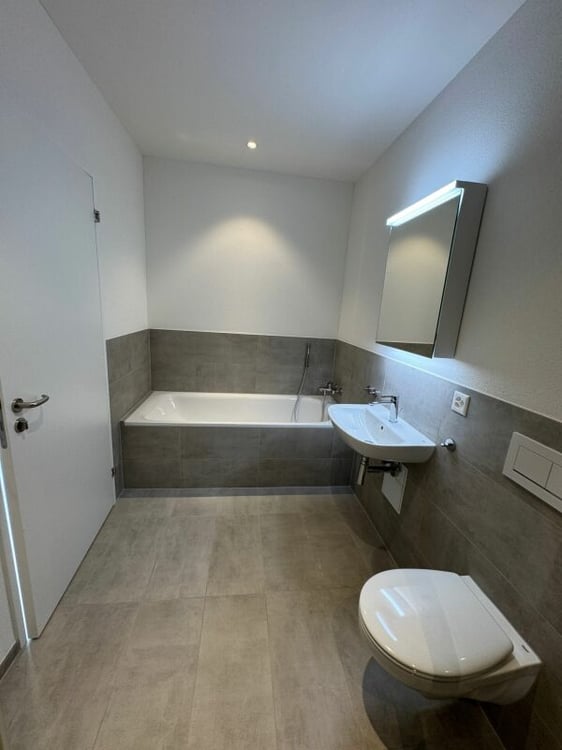 Erstvermietung: hochwertige 1.5-Zimmer-Attikawohnung mit Schloss- & Bergsicht 7