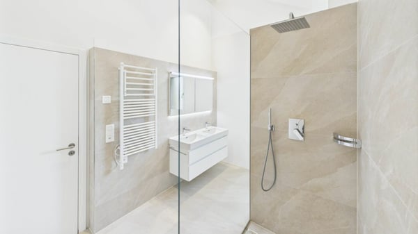 Neubau-Traum: Modernes 1.5-Zimmer-Haus mit Sitzplatz 9