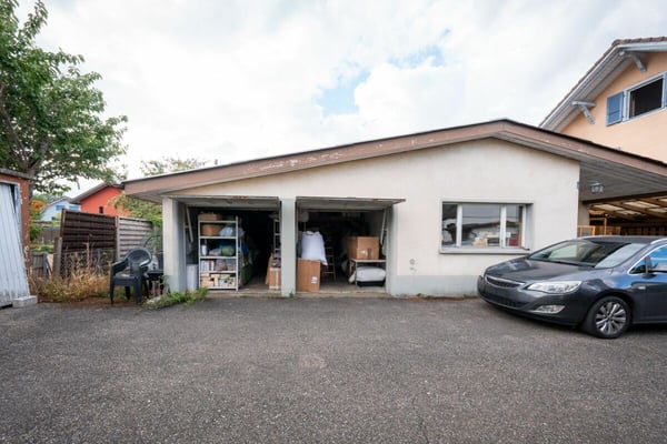 Zweifamilienhaus mit Garagen, Werkstatt und Lagerräumen zu verkaufen 7