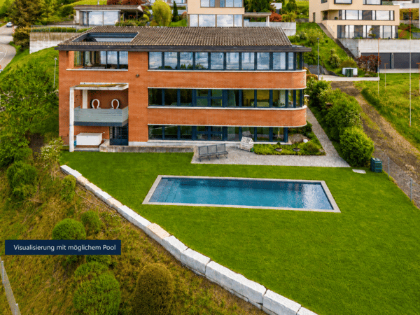 WO DER SEE ZUM PANORAMA WIRD: EXKLUSIVES EINFAMILIENHAUS AUF GROSSZÜGIGEM GRUNDSTÜCK 1