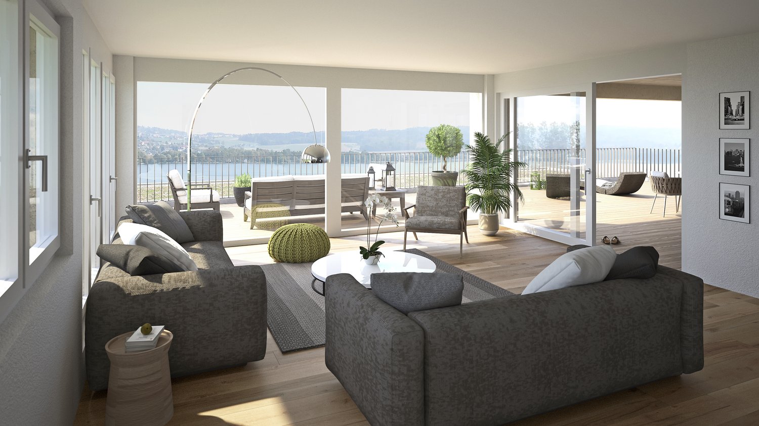 Spacious living room with a terrace, large windows, couches, coffee table, and decorative plants