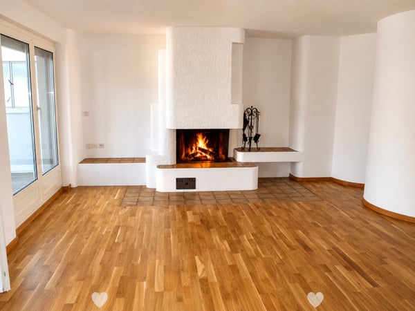Helle Attikawohnung mit grosser Terrasse und Cheminée 1