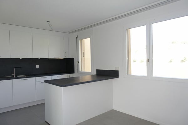 Renovierte 3.5 Zi-Eigentumswohnung mit Balkon und Einstellhallenplatz 1