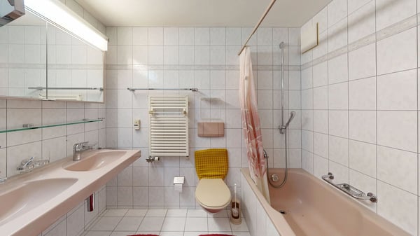 Zentral gelegene 3.5-Zimmer-Wohnung mit Einstellhallenplatz 11