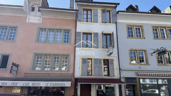 Immeuble de rendement avec 6 appartements et un commerce 1