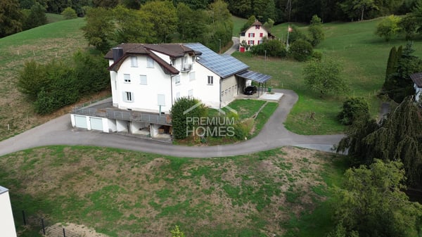 Grosses Bauland mit Entwicklungspotenzial & saniertem Mehrfamilienhaus 3