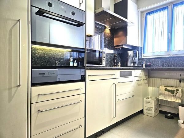 Freistehendes Einfamilienhaus an familienfreundlicher Lage mit Garten und Alpensicht 9
