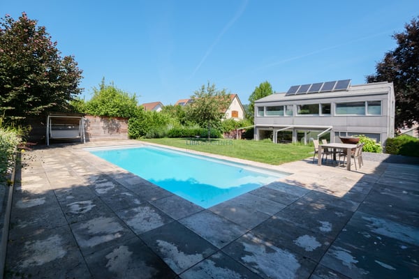 Zeitlose Eleganz trifft Wohnkomfort Modernes EFH mit Pool & Gartenoase 12