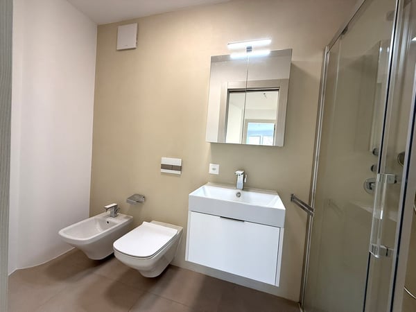 Moderno 1.5 locali con vista, 2 box inclusi ! 10