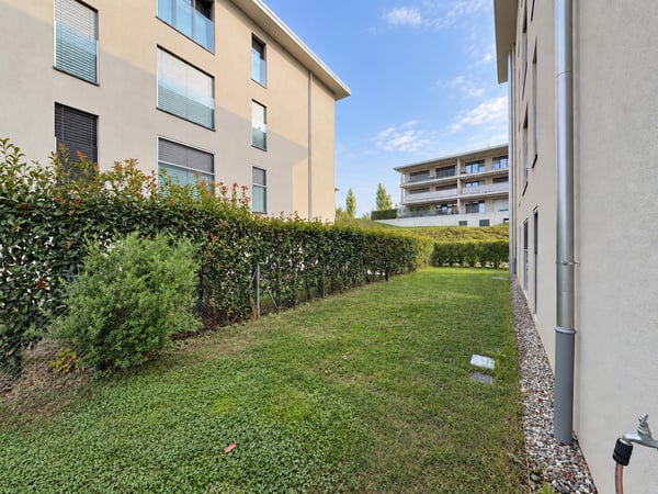 APPARTAMENTO 4.5 LOCALI CON AMPIO GIARDINO 10