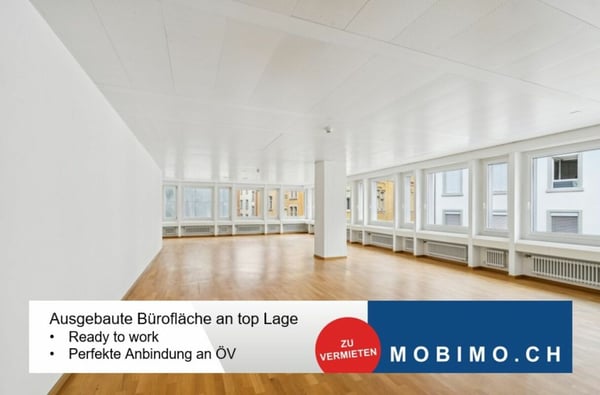 Lichtdurchflutetes Büro mit Blick in den Innenhof 1