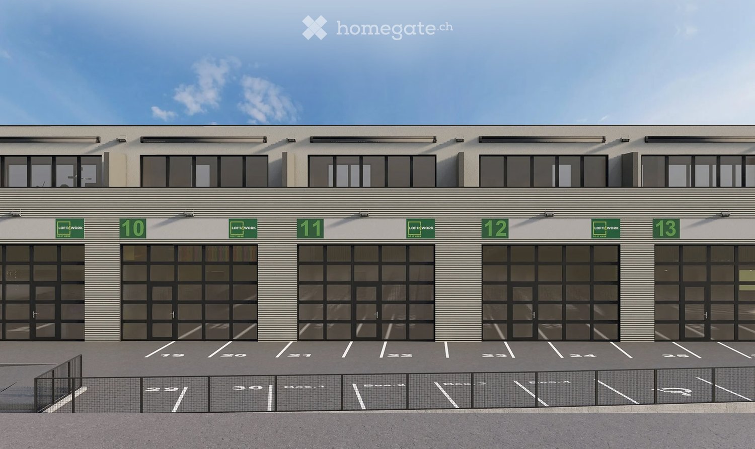 Industrial building with 4 parking spots in front, 4 doors labeled 10 to 13.