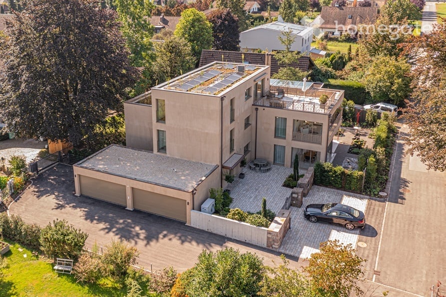 Modern 3-story house, green roof, garage, solar panels, swimming pool