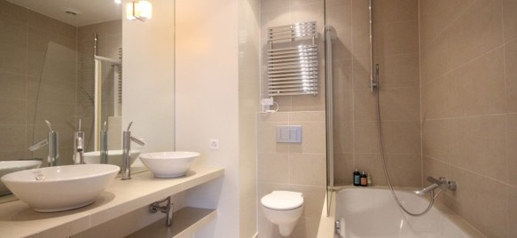 Appartement de prestige, moderne et lumineux, dans immeuble historique de l'hypercentre de Genève 12