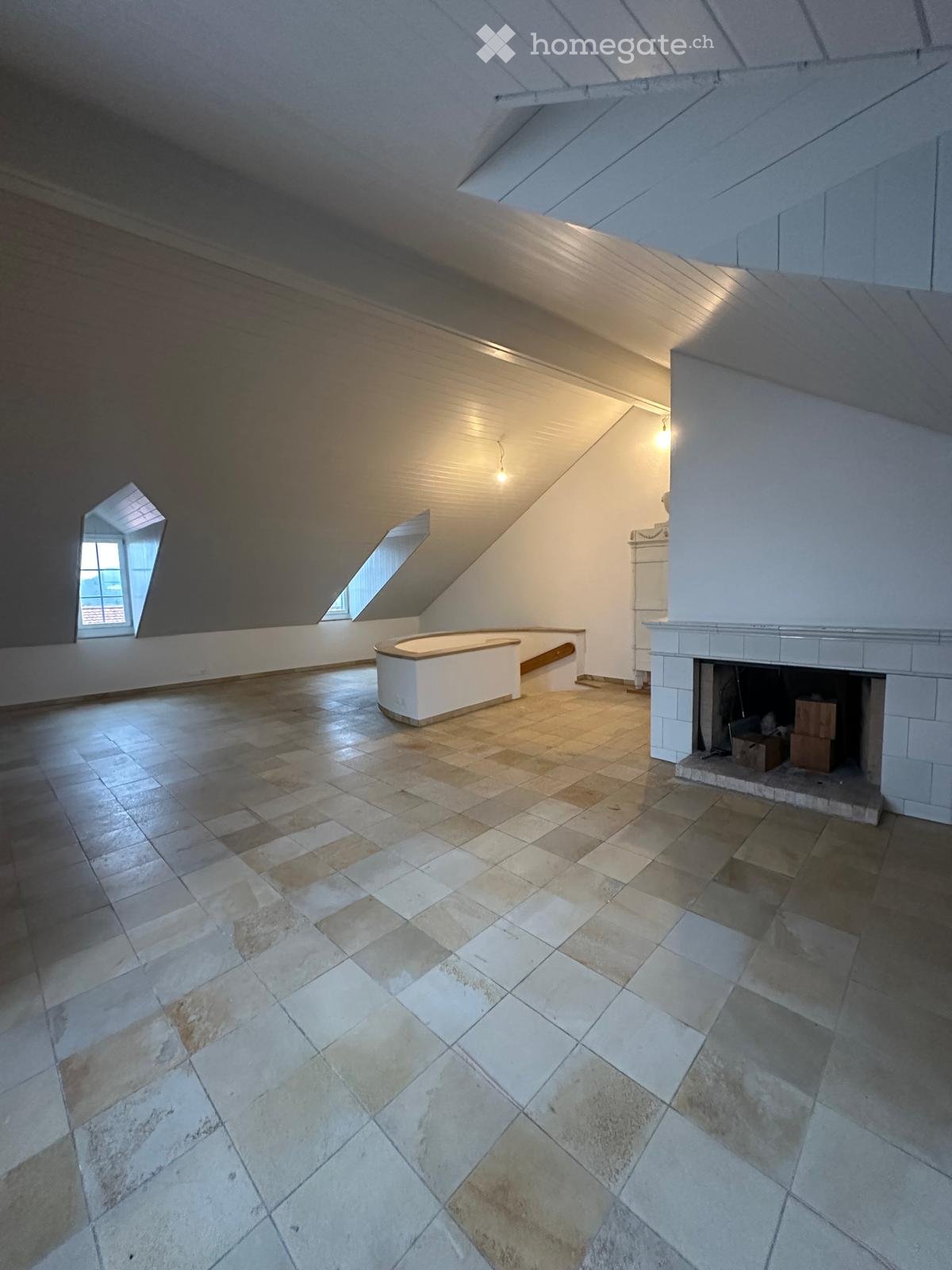 large tiled floor, wooden ceiling, white walls, fireplace