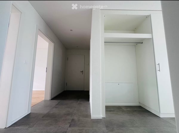 Appartement neuf de 3,5 pièces avec un grand jardin et un parking souterrain inclus 4