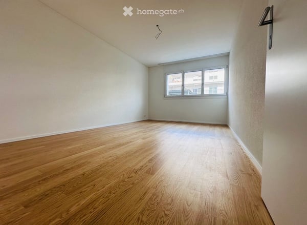 Appartement neuf de 3,5 pièces avec un grand jardin et un parking souterrain inclus 2