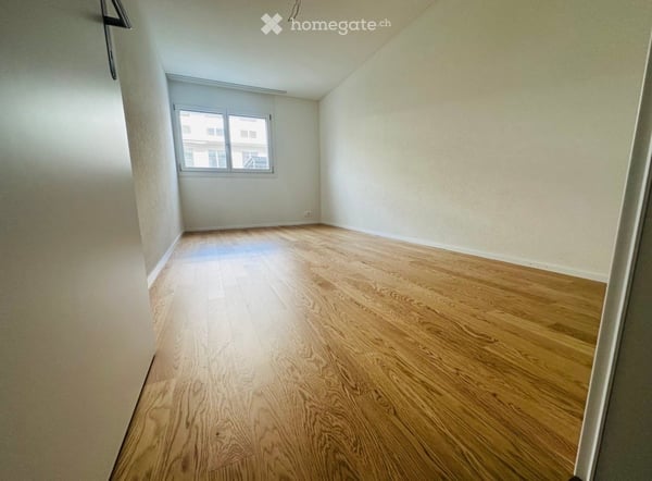 Appartement neuf de 3,5 pièces avec un grand jardin et un parking souterrain inclus 3