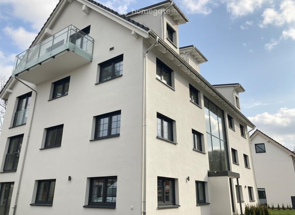 Wohnen im Grünen - Stilvolle Neubau 3-Zimmer-Wohnung 9