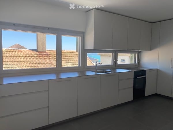 Appartements neufs de 2.5 pièces avec deux balcons à Peseux/NE, parking inclus. 30