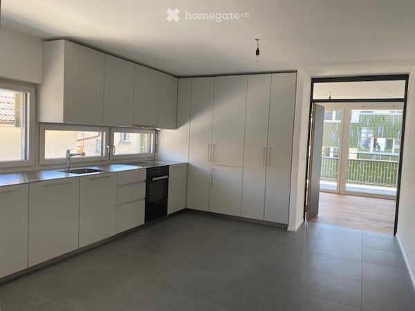 Appartements neufs de 2.5 pièces avec deux balcons à Peseux/NE, parking inclus. 26