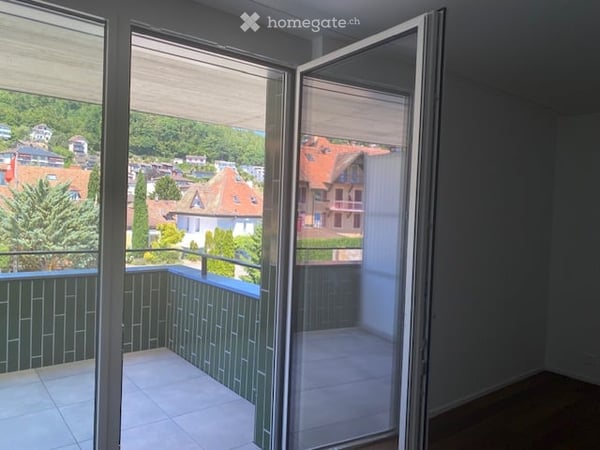 Appartements neufs de 2.5 pièces avec deux balcons à Peseux/NE, parking inclus. 3