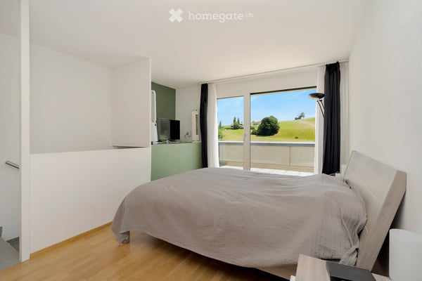 Charmantes Doppeleinfamilienhaus mit Idyllischem Garten 8