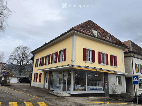 Deux immeubles locatifs avec garage à Couvet 1