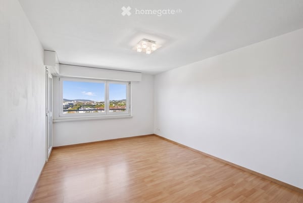 3.5 Zimmer im 12. Stock mit Südbalkon und zwei Parkplätzen 2