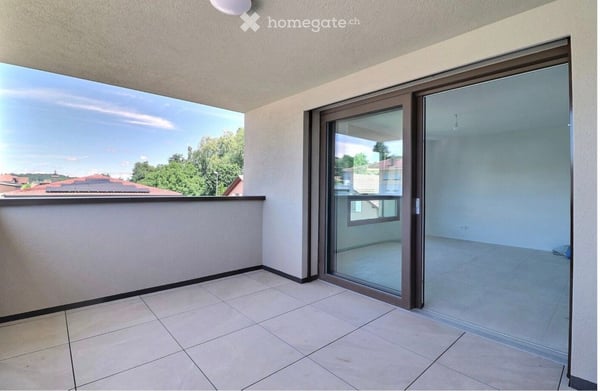 1er LOYER OFFERT - 3,5 pièces neuf de 68 m² à Corminboeuf — 2'115 charges comprises, libre de suite. 3