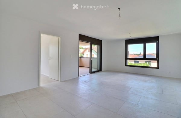1er LOYER OFFERT - 3,5 pièces neuf de 68 m² à Corminboeuf — 2'115 charges comprises, libre de suite. 2
