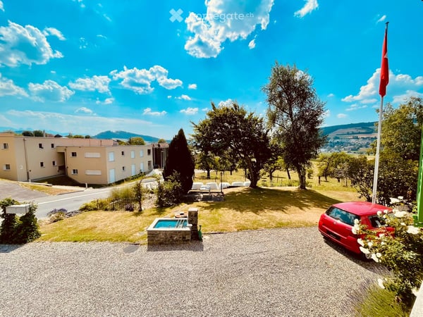 5.5-Zimmer-Wohnung mit Garten, Werkraum und viel Freiraum 3
