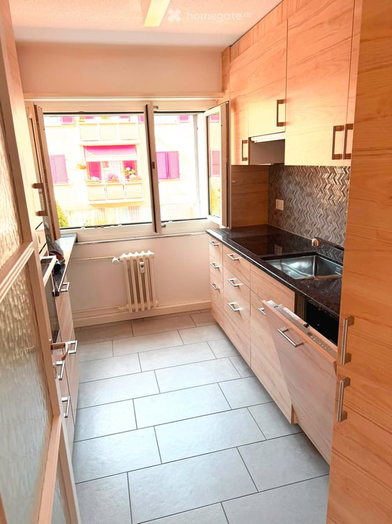 Charmante 3-Zimmer-Wohnung mit Südbalkon, Blick ins Grüne & Carport in Pratteln 2
