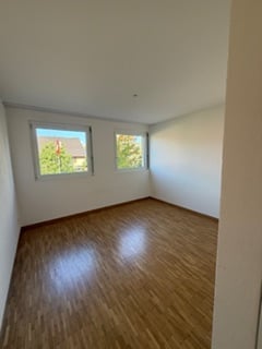 Maisonette-Wohnung (EG und 1. OG) mit Gartensitzplatz 12