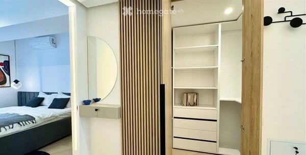 Appartement récemment rénové avec du mobilier moderne à Genève 8