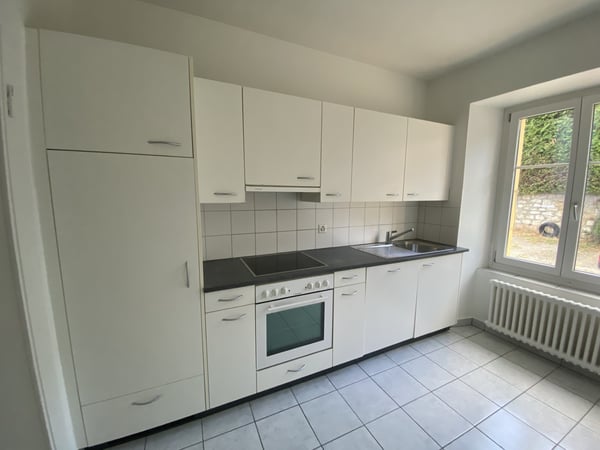 Appartement de 3 pièces au rez-de-chaussée supérieur 1