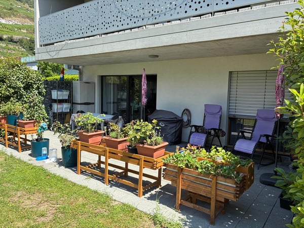 REZ avec terrasse et accès pelouse – 2 places de parc 2