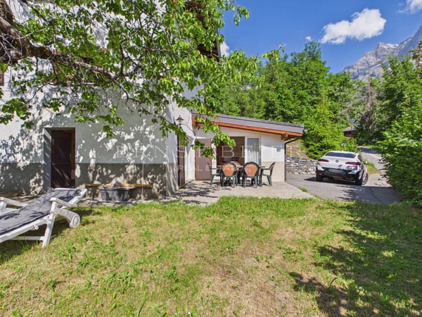 Chalet mitoyen avec cachet dans un environnement paisible et verdoyant 9
