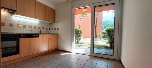 Camorino - 2 locali con giardino (ref. 155-5) 1