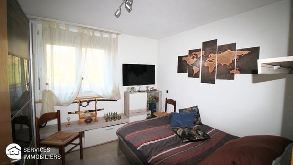 Appartement rez-de-jardin tout confort 9