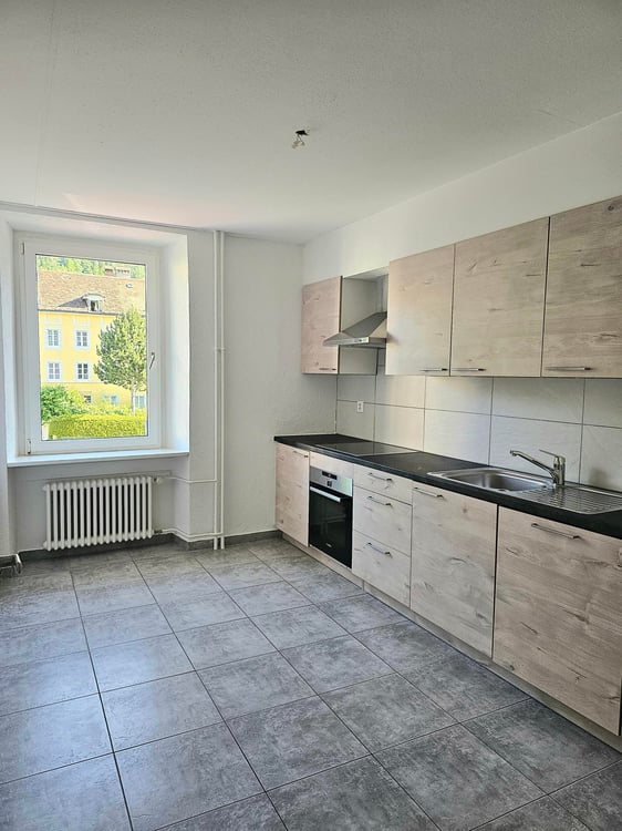 Appartement rénové de 4 pièces au centre du village 1