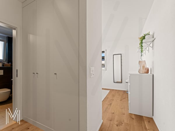 Magnifique appartement en attique de 5.5 pièces, avec vue et situation exceptionnelles à quelques minutes du centre-ville ! 12